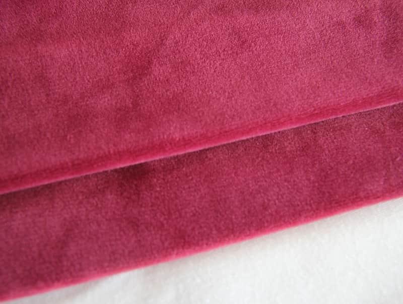 ¿Cómo afecta el peso y la densidad de la tela de la tela de peluche al precio?